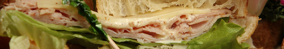 Eating Sandwich at The Sandwich Shoppe restaurant in Rutland, VT.